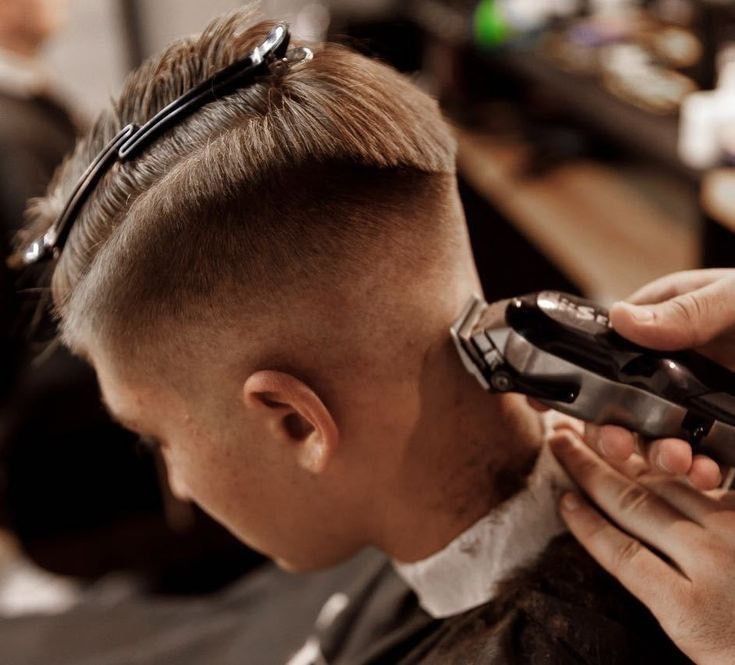 Online barber education on a laptop